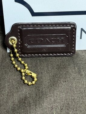Coach Brown 2.75” Patent Leather Hangtag